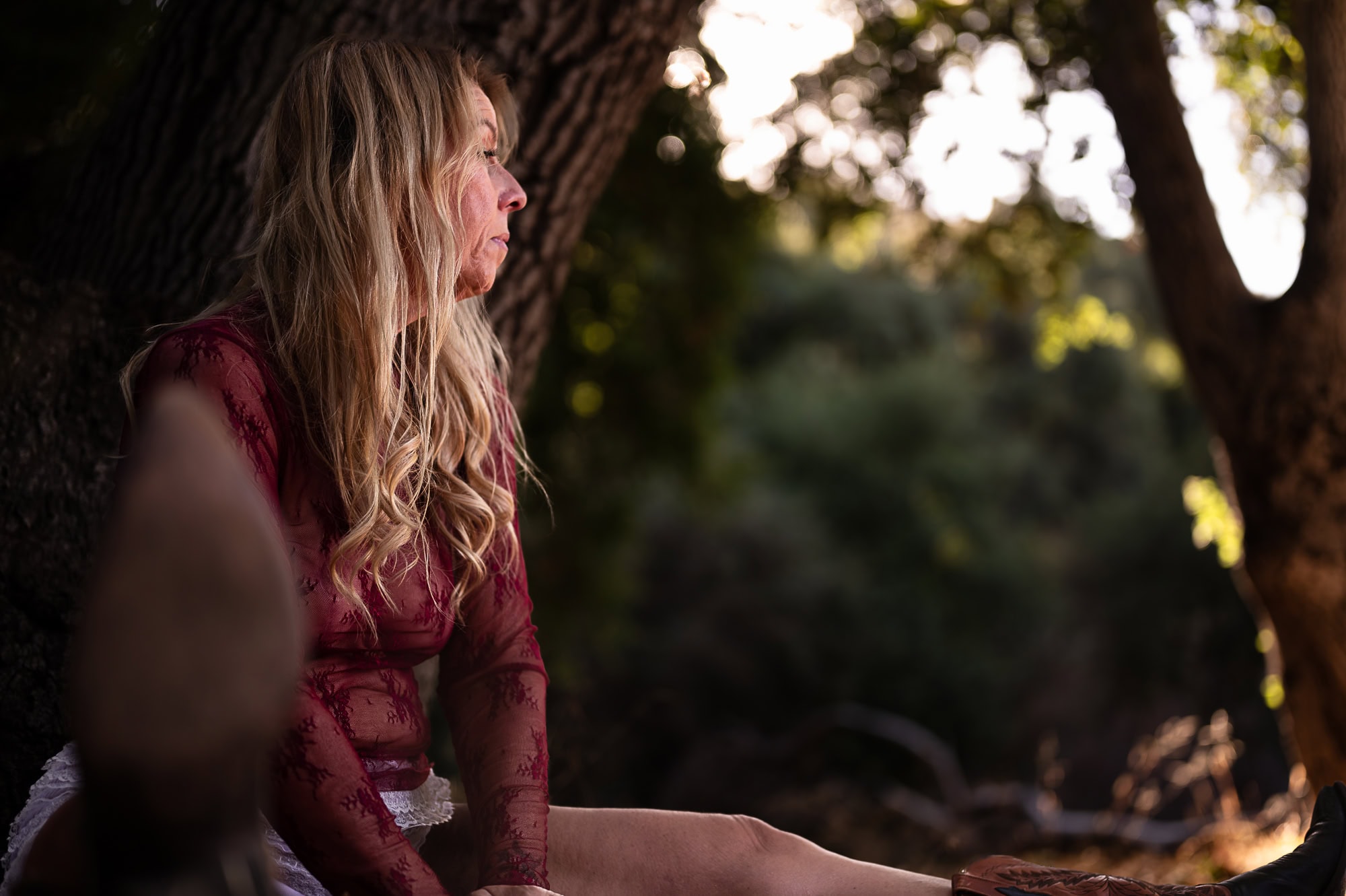 Close-up Outdoor Los Angeles Boudoir Photograph with Cowboy Boots and Sheer Lace Top.