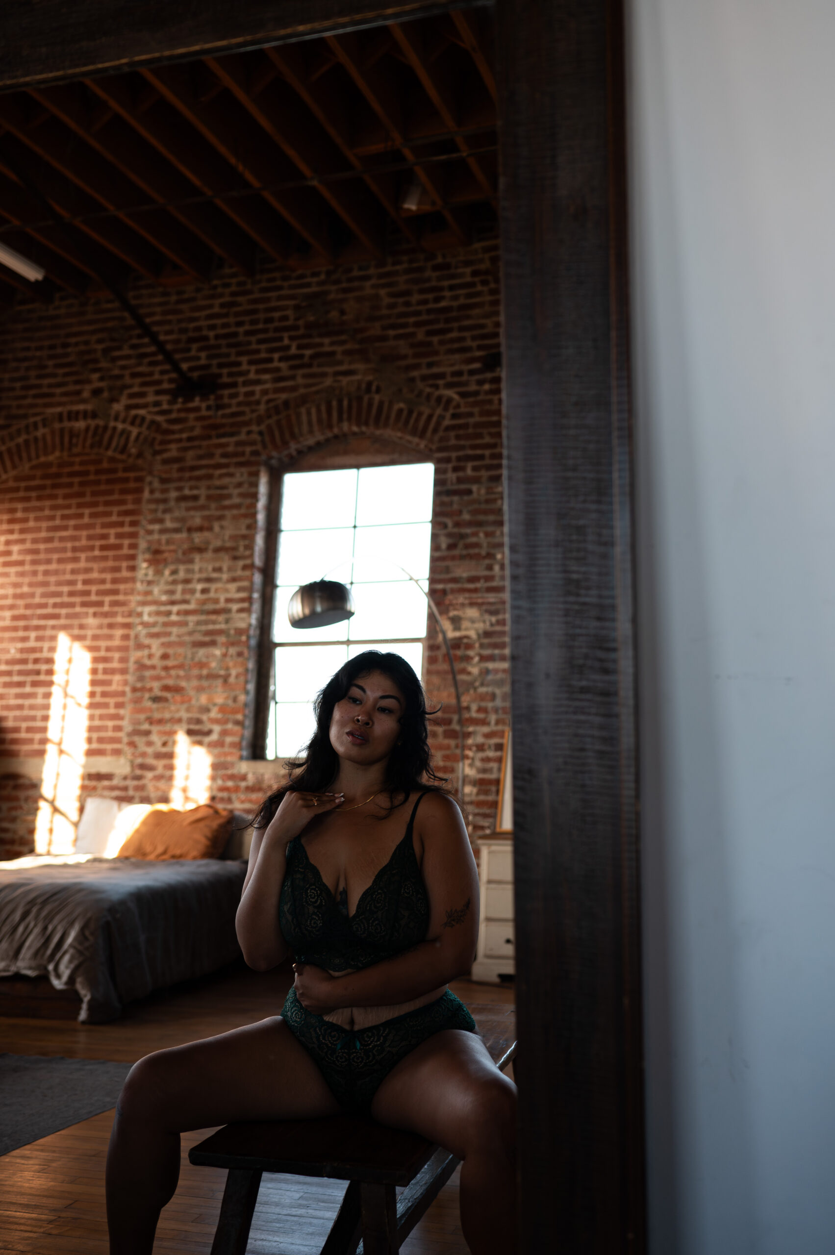 boudoir photograph of a client wearing a plunge bra and panty set. 