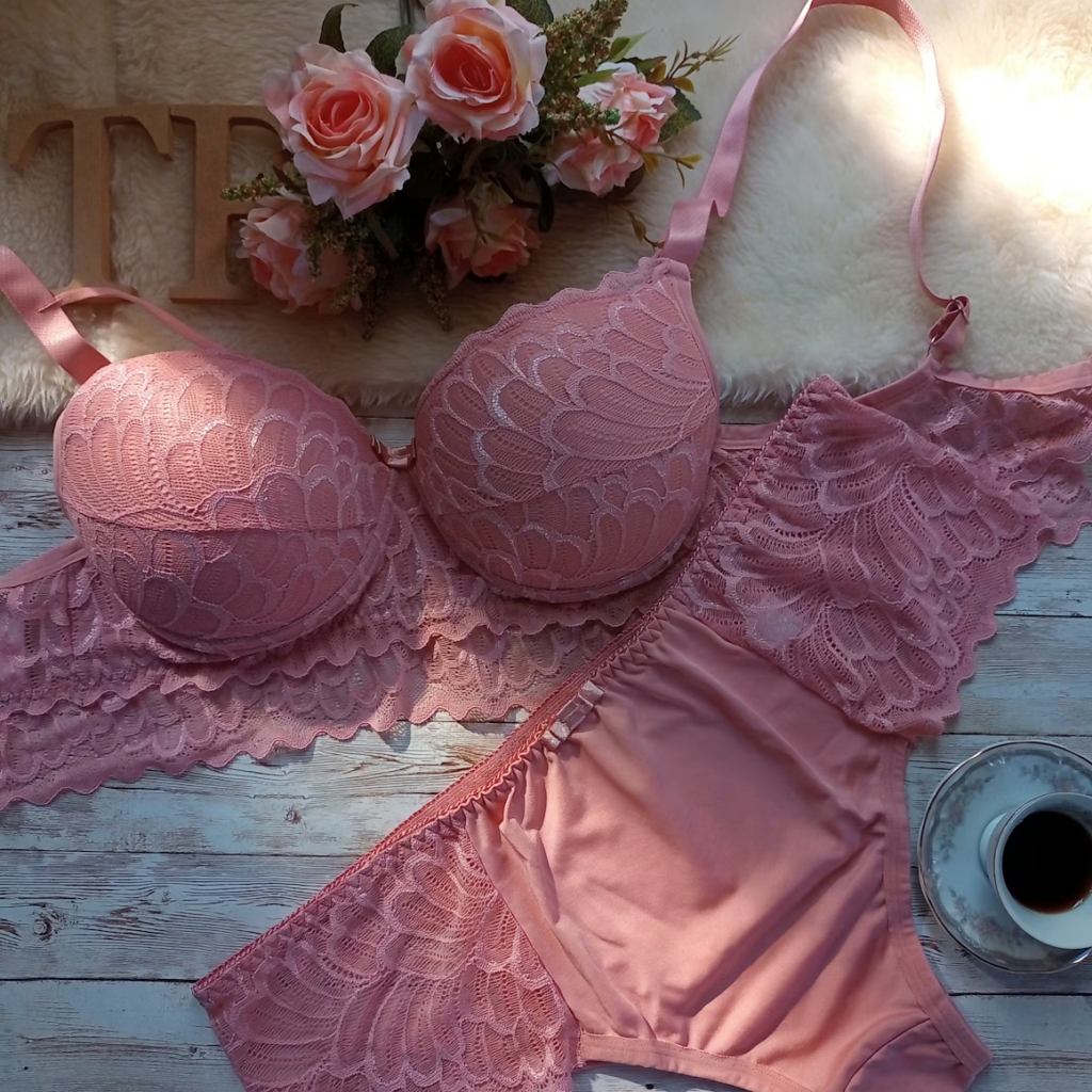 photo of a pink bra and panty set with lace scalloped patterns.