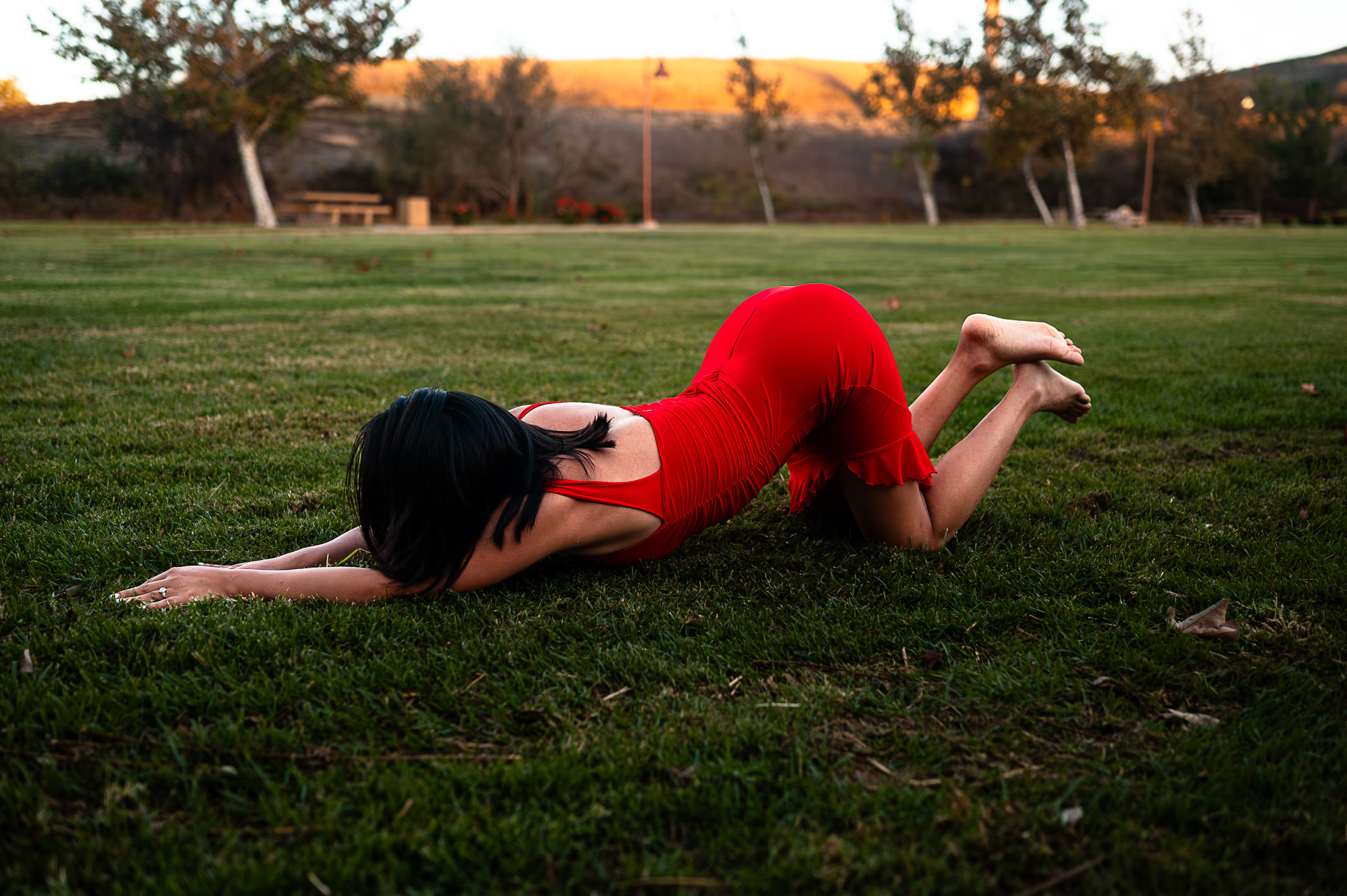 ELI Boudoir Luxury boudoir photography in Los Angeles. This image showcases a beautiful red dress as an example for the best boudoir lingerie for every skin tone. 