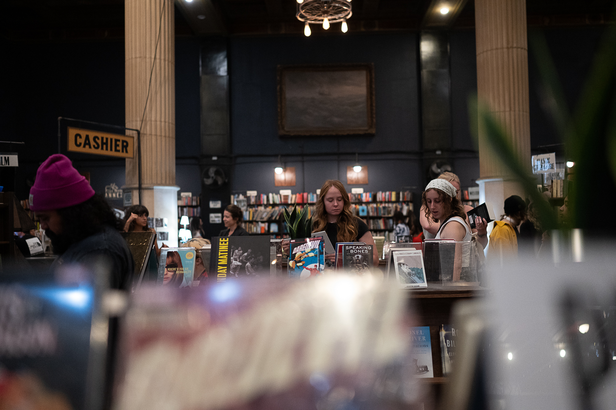 People browsing books in The Last Bookstore in LA
